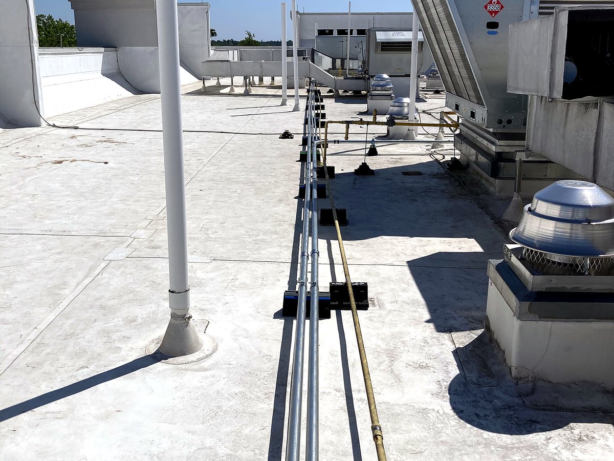 Commercial rooftop conduit run installed by D'Amore Enterprises