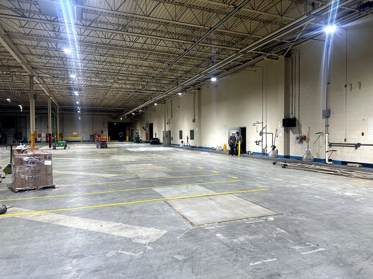 Large empty warehouse with full LED lighting installation
